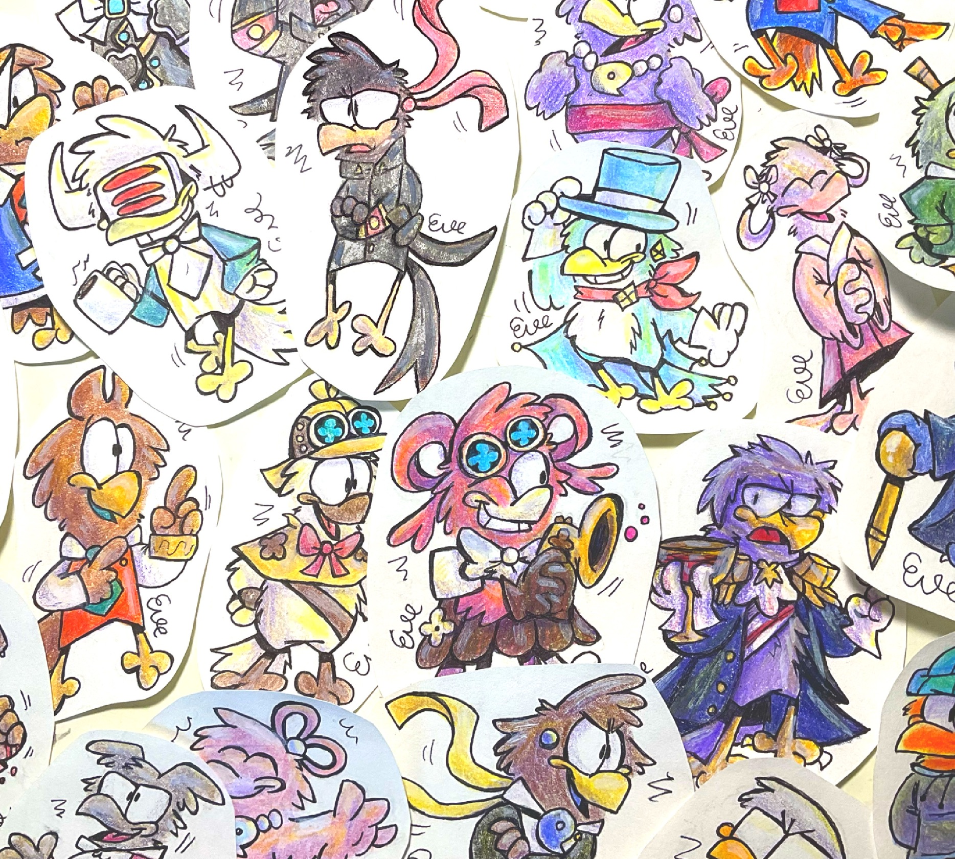 Dozens of cut-out pieces of paper with Ace Attorney characters as birds drawn on them.